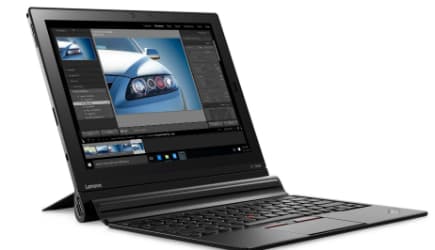 Tablette hybride Lenovo ThinkPad X1 noire avec clavier détachable, écran affichant une application de retouche photo