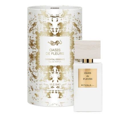 Eau de parfum Oasis de Fleurs by RITUALS, avec son flacon 50 ml blanc et doré et son étui cylindrique orné de motifs géométriques