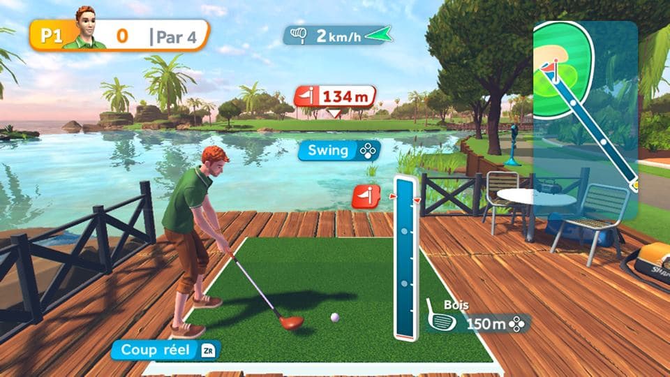 Gameplay de Sports Party sur Nintendo Switch montrant une épreuve de golf, avec un avatar sur un terrain verdoyant au bord d'un lac tropical