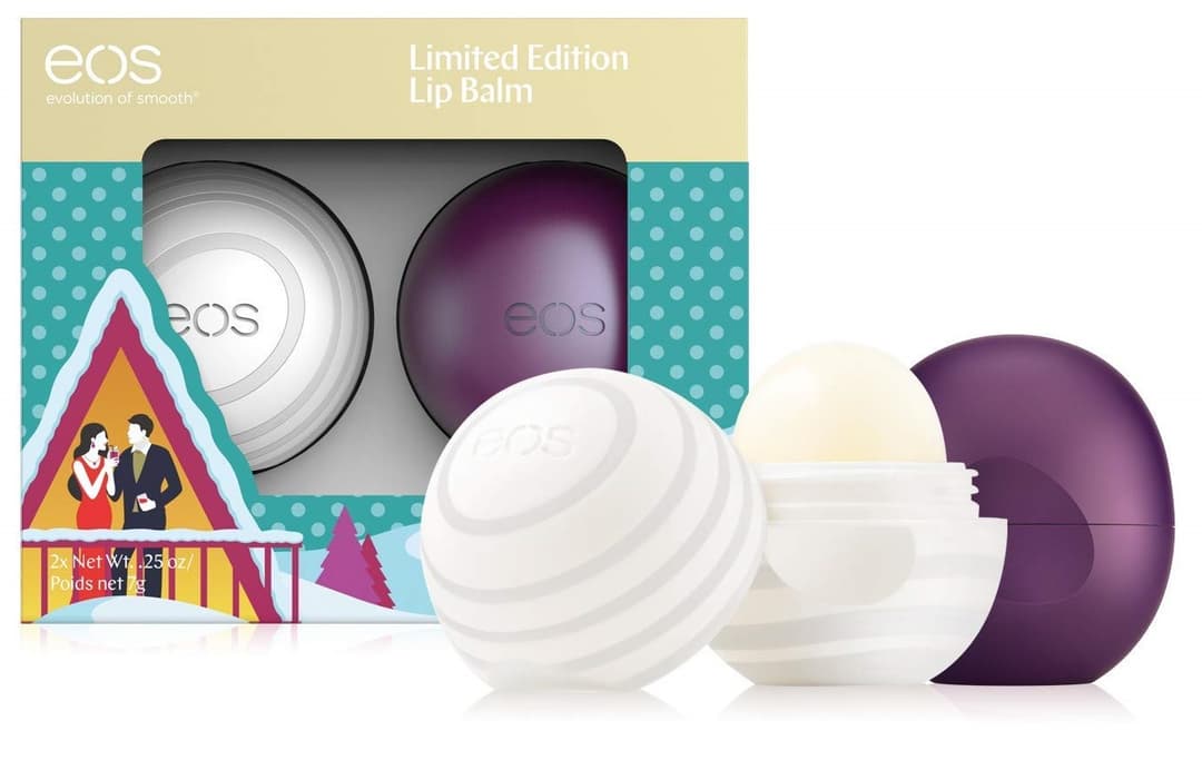 Calendrier de l'Avent eos avec coffret édition limitée contenant 14 baumes à lèvres sphériques blancs et violets