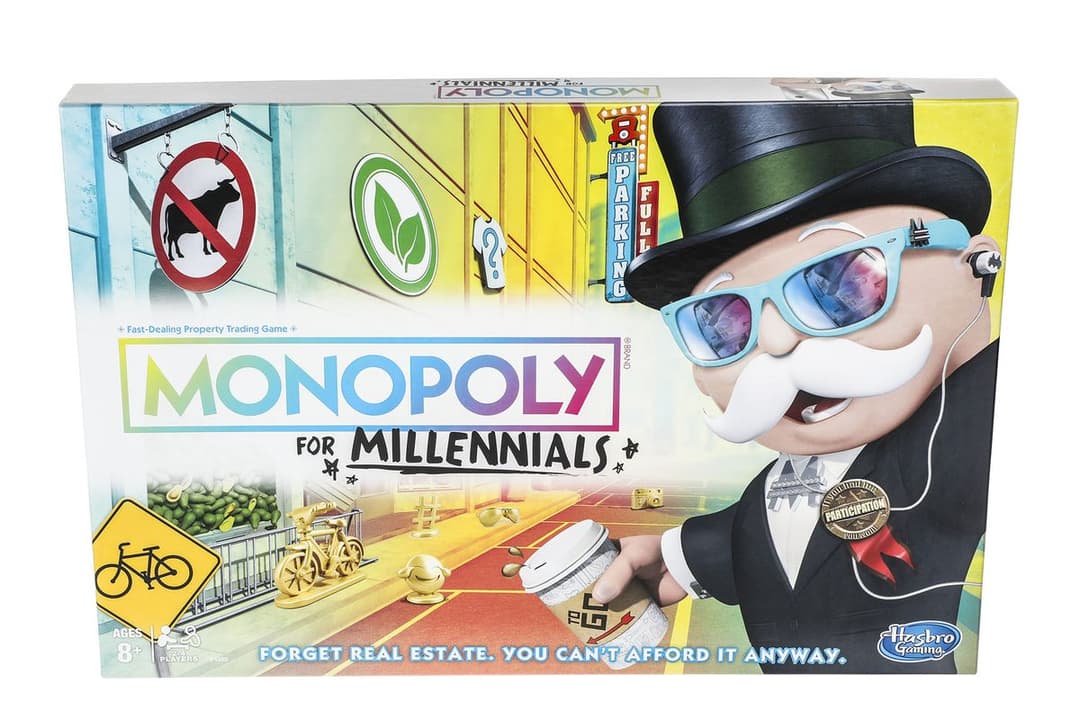 Boîte du Monopoly For Millennials de Hasbro, version du célèbre jeu de société avec le mascotte Mr. Monopoly portant des lunettes de soleil bleu