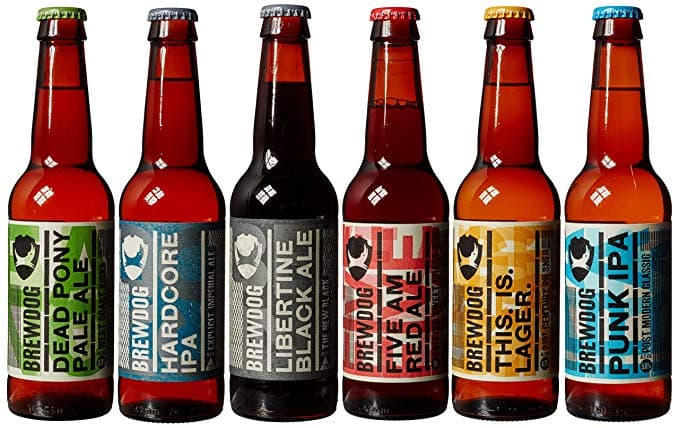 Six bouteilles de bière IPA BrewDog aux capsules colorées et étiquettes variées, illustrant la diversité des saveurs et arômes des IPA modernes