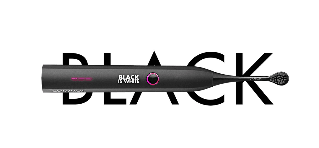 Brosse à dents électrique Curaprox Hydrosonic noire avec anneau rose, tête piriforme visible