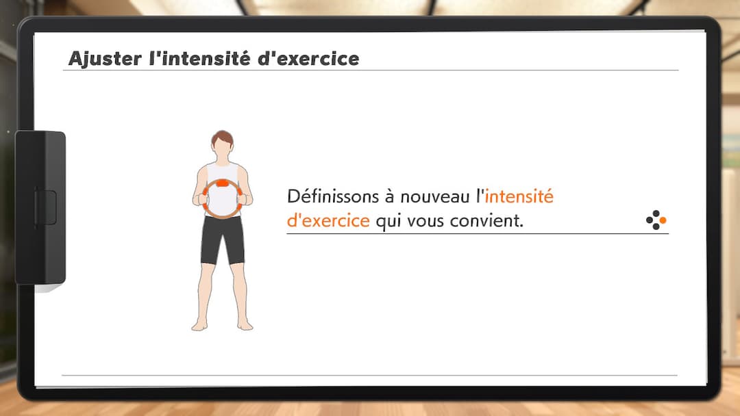 Écran de Ring Fit Adventure affichant un personnage tenant un anneau rouge avec l'option d'ajuster l'intensité d'exercice