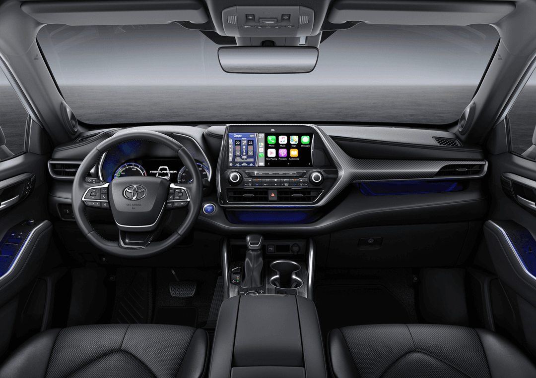 Habitacle du Toyota Grand Highlander avec volant, écran multimédia 12,3 pouces, sièges noirs et finitions anthracite