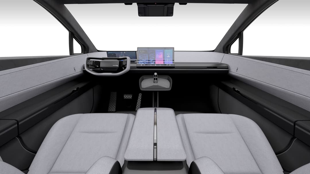 Intérieur du Toyota bZ Compact SUV avec sièges gris clair, écran tactile affichant des ambiances lumineuses colorées et assistant personnel embarqué