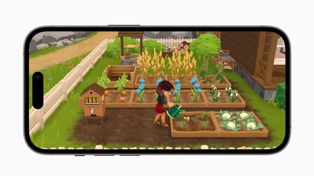 Wylde Flowers sur iPhone, jeu de gestion agricole montrant un personnage arrosant des cultures dans un potager
