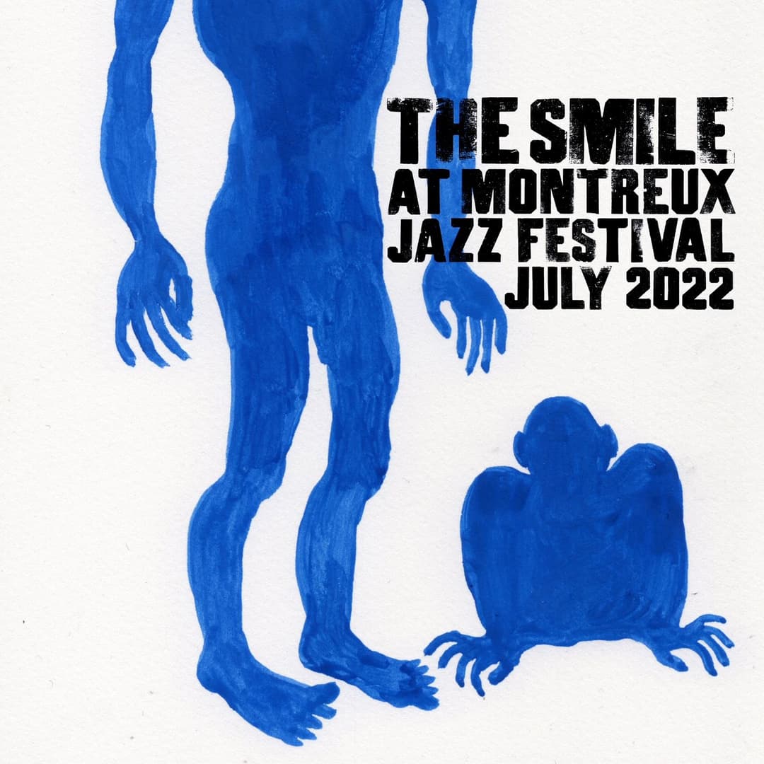 Affiche de l'album live The Smile at Montreux Jazz Festival July 2022, avec deux figures bleues et texte noir sur fond blanc