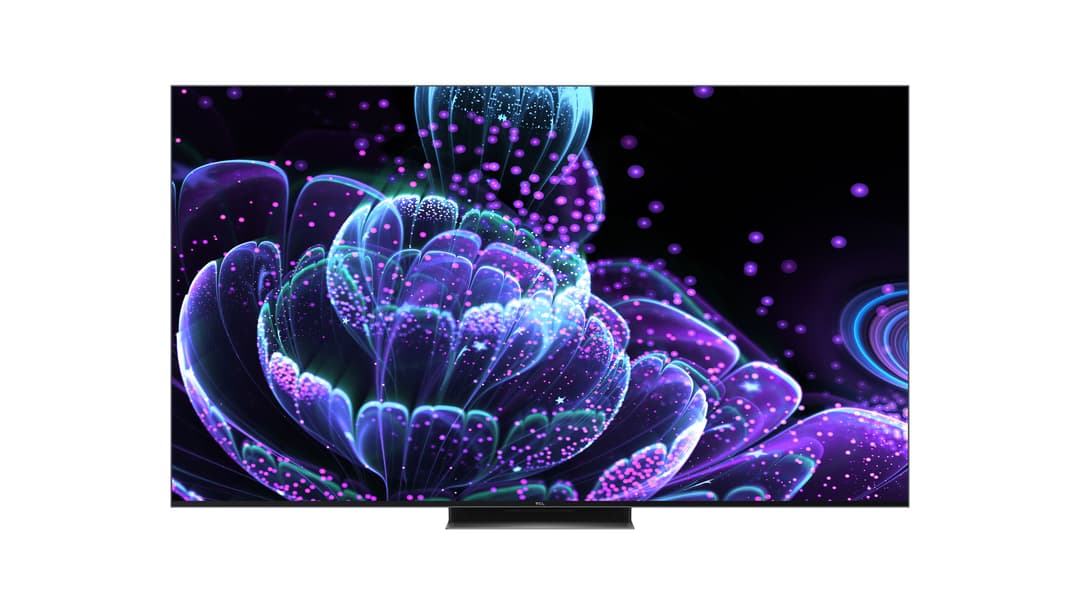 Téléviseur TCL 75C935 affichant des formes abstraites brillantes en rose et bleu fluorescent sur fond noir