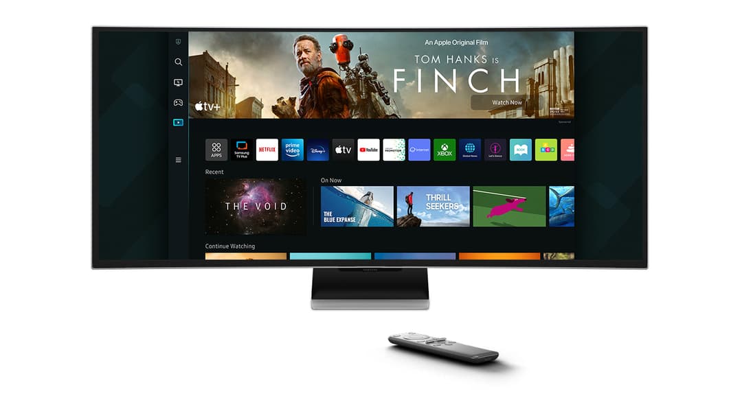 Moniteur Samsung Odyssey OLED G8 affichant l'interface Samsung TV Plus avec applications de streaming et télécommande
