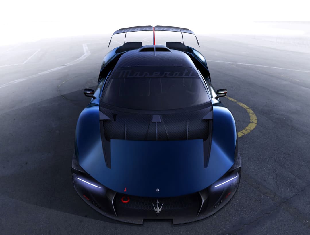 Maserati MCXtrema bleu foncé vue de dessus sur une piste, design aérodynamique avec bande rouge et éléments en carbone