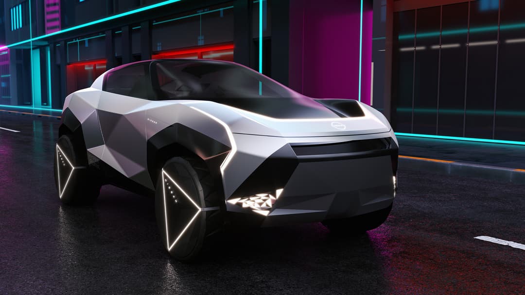 Nissan Hyper Punk Concept, véhicule électrique au design futuriste blanc et noir avec phares géométriques lumineux, dans un environnement urbain aux néons cyan et magenta