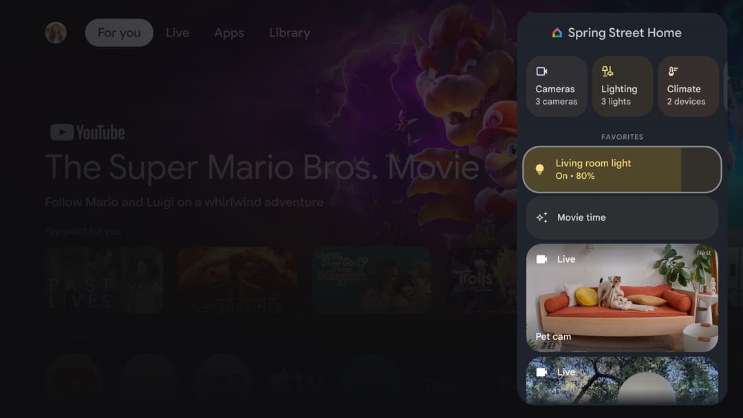 Interface Google TV Streamer affichant Super Mario Bros Movie, avec panneau de contrôle maison connectée listant caméras, éclairage et climat