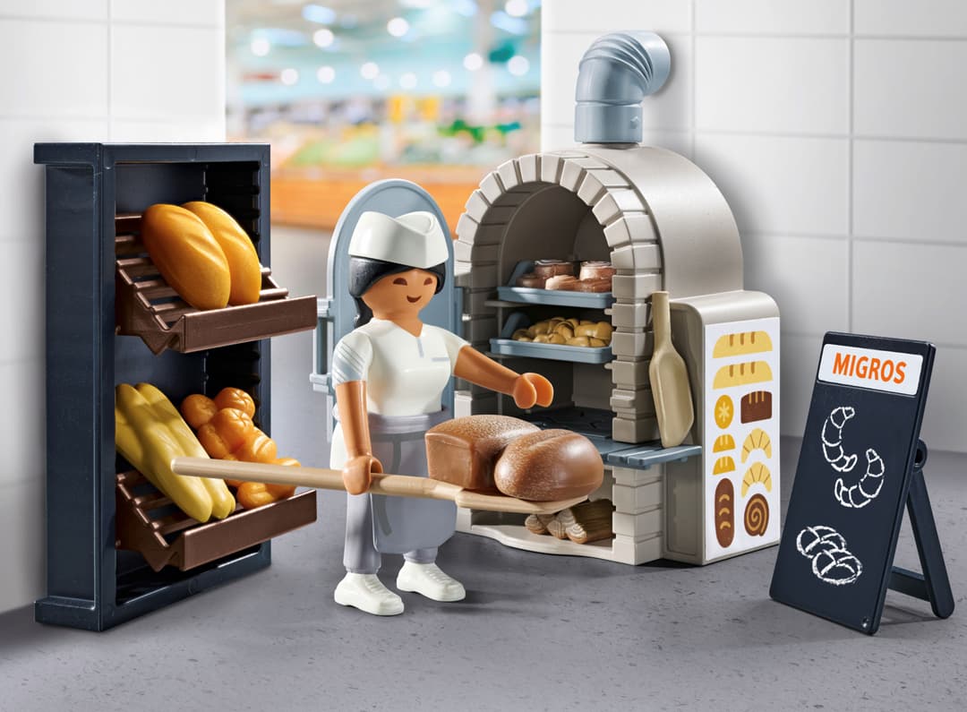 Set PLAYMOBIL Magasin Migros avec boulangère, four à pain, étalage de produits de boulangerie et menu d'affichage