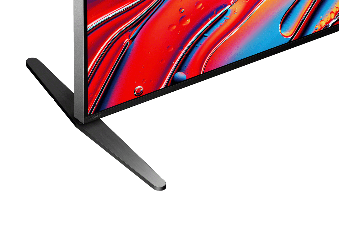 Téléviseur Sony BRAVIA 9 avec écran affichant des dégradés rouge et bleu, pieds noirs