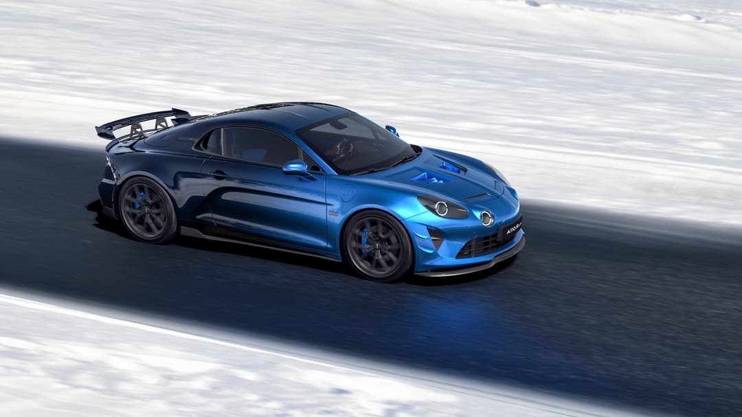 Alpine A110 R Ultime bleue de profil, avec aileron carbone, sur circuit enneigé