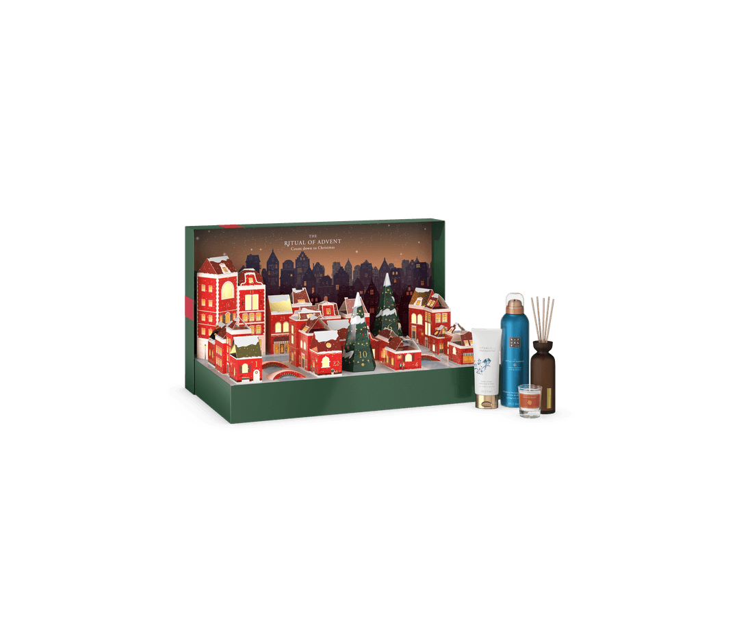 Calendrier de l'Avent Rituals Deluxe avec maisons d'Amsterdam en rouge et or, boîte verte, accompagné de produits de soin et bougies