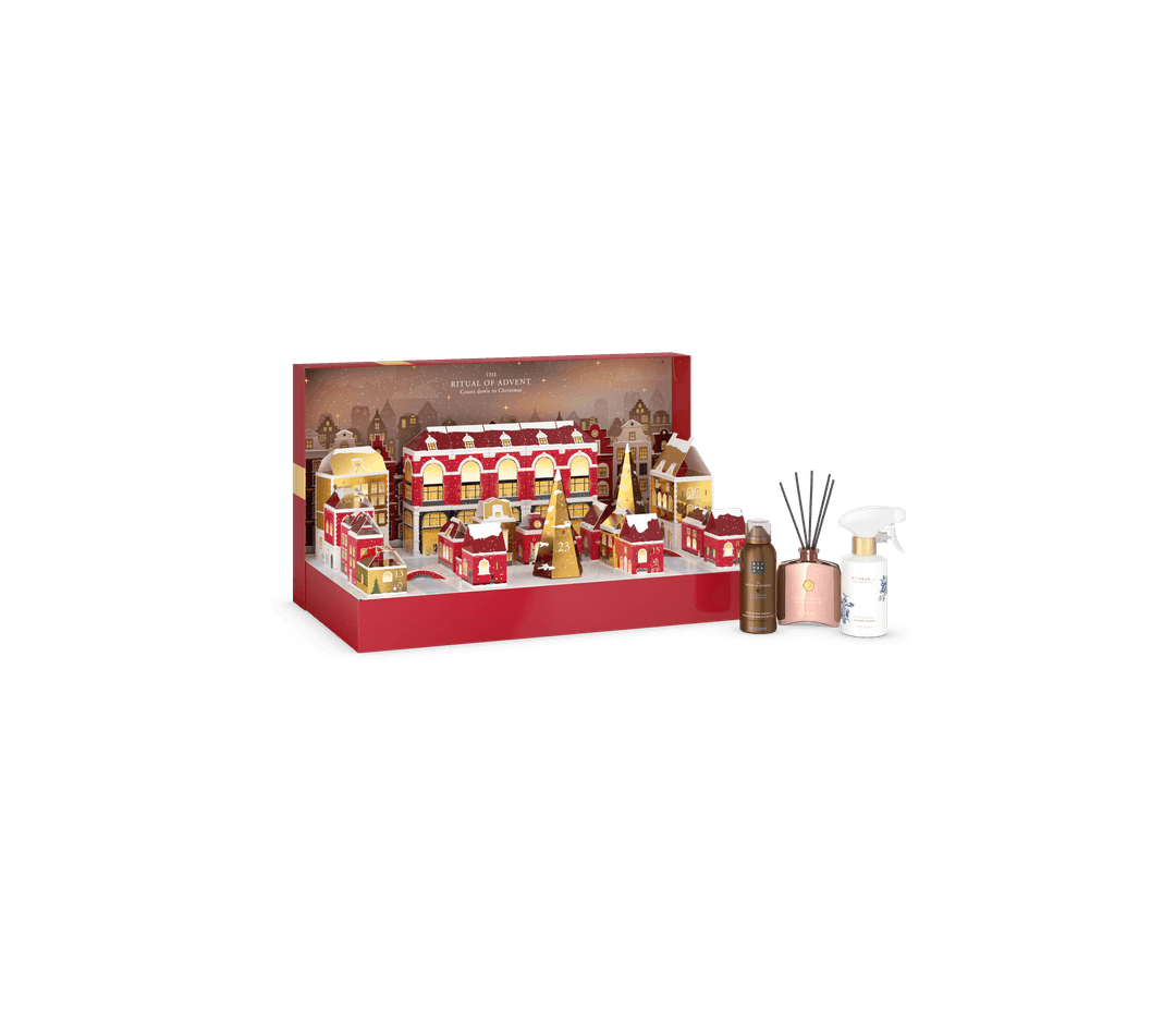 Calendrier de l'Avent RITUALS pour homme avec village enneigé rouge et or, accompagné de produits de soins