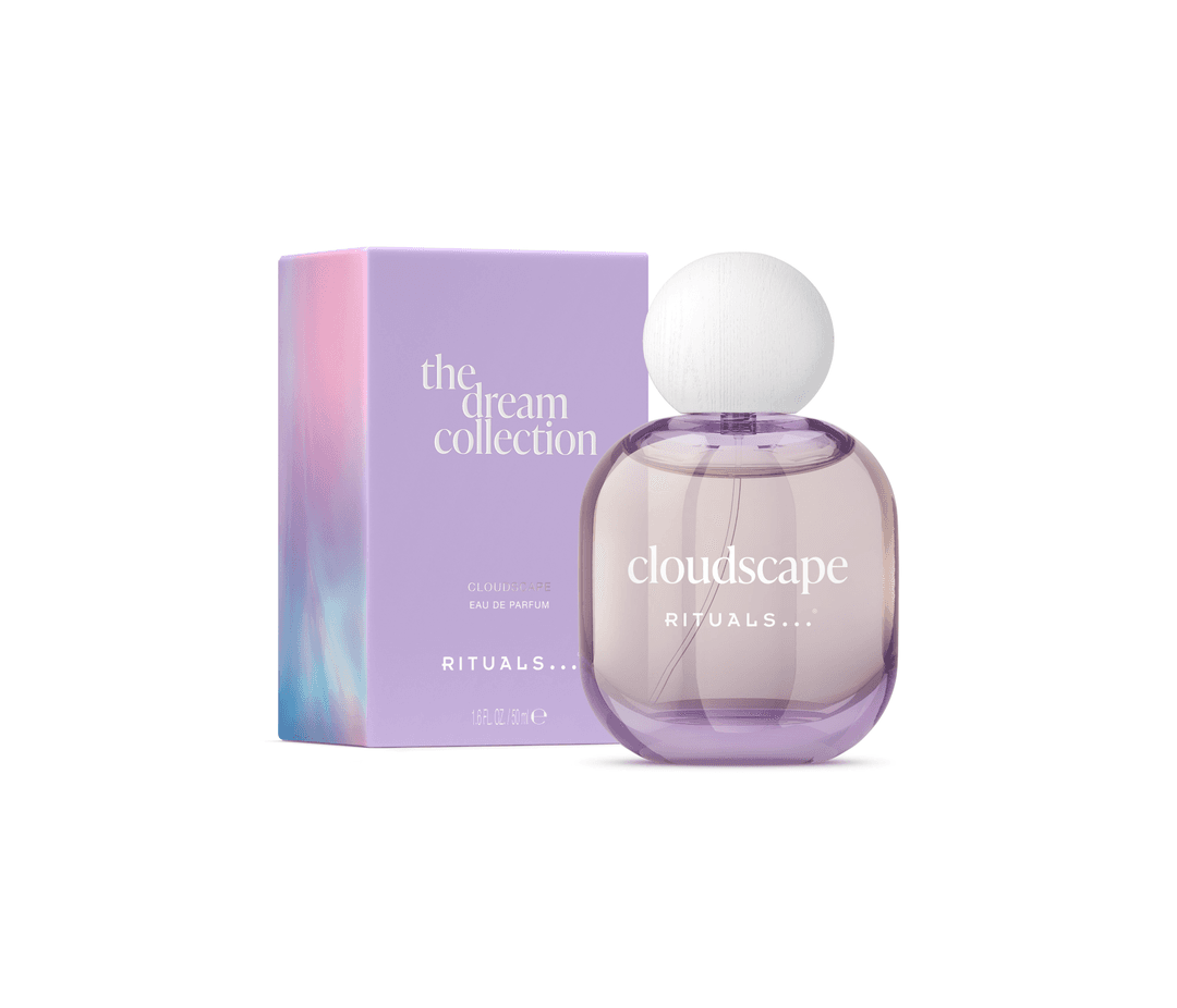 Flacon de parfum Cloudscape Rituals de la collection The Dream Collection aux tons roses et violets, avec son emballage dégradé assorti