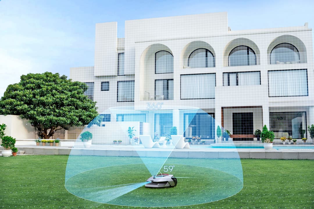 Robot de tonte Dreame A2 sur un gazon, avec visualisation en bleu de son champ de détection LiDAR 360°