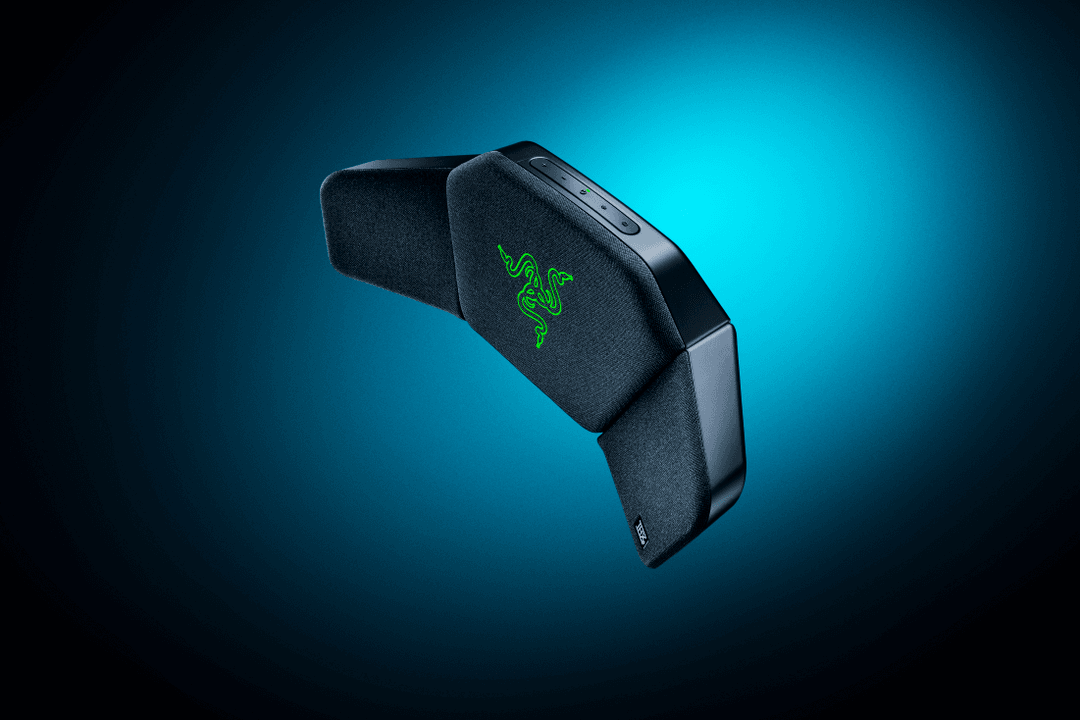Razer Clio, accessoire audio gris et noir avec logo vert, sur fond bleu turquoise