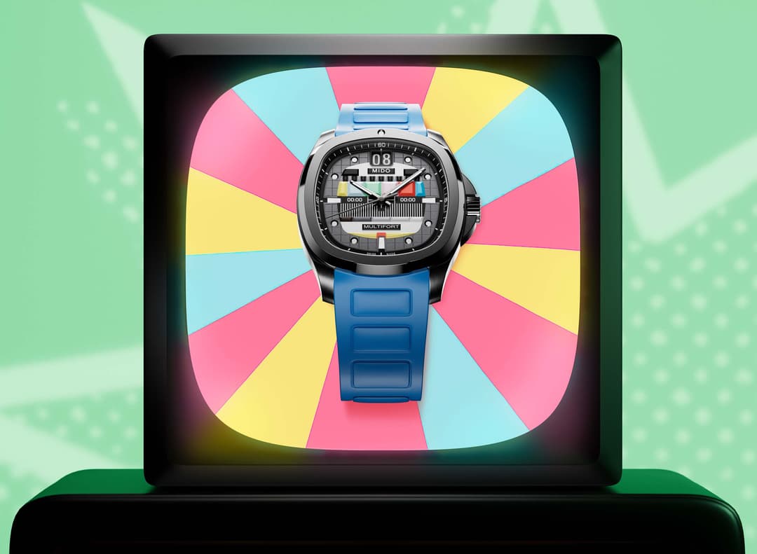 Montre Mido Multifort TV Big Date affichée sur écran de télévision rétro avec motif coloré rose, jaune et bleu
