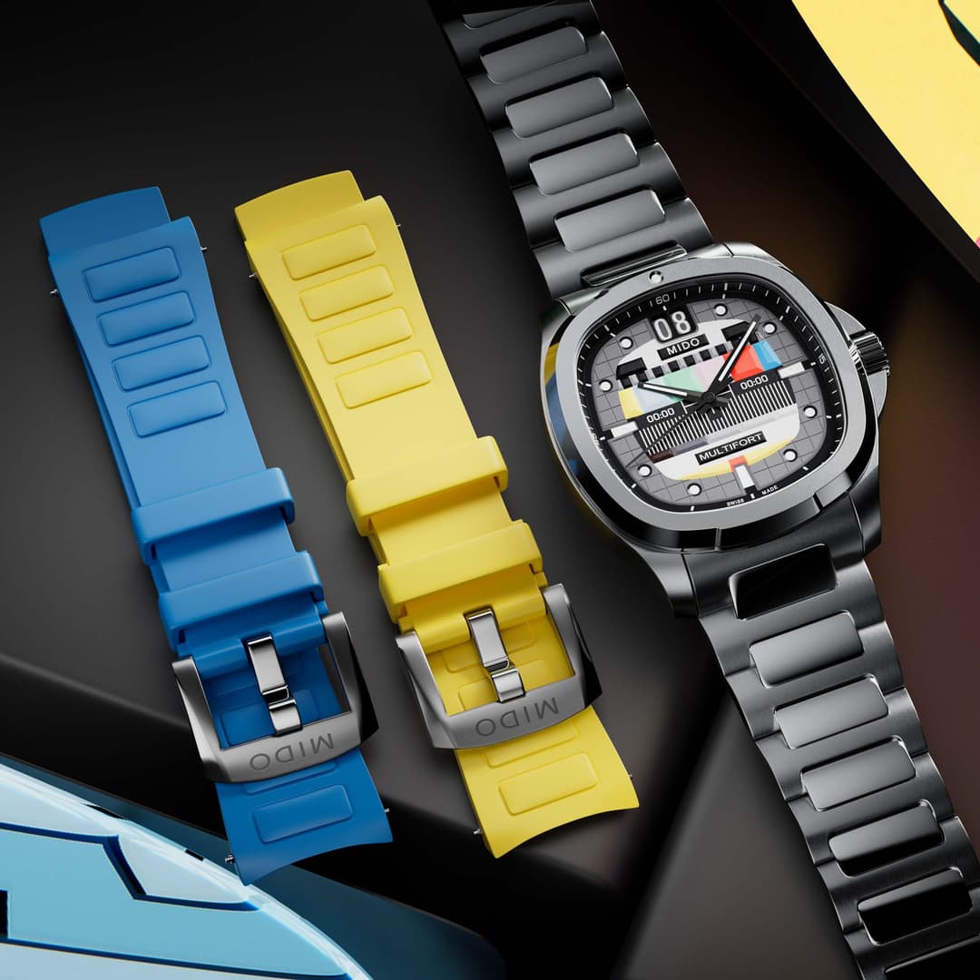 Montre Mido Multifort TV Big Date avec cadran noir et bracelets interchangeables bleu, jaune et gris acier