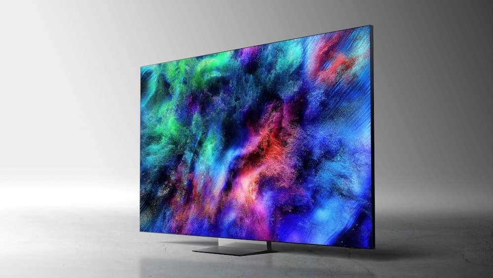 Téléviseur Samsung affichant un motif abstrait aux teintes vibrantes de bleu, rose, vert et violet, démontrant la technologie Micro RGB