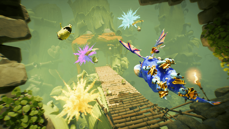 Rayman en costume bleu et or saute sur une plateforme dans un univers vert jungle avec Globox et des ennemis colorés