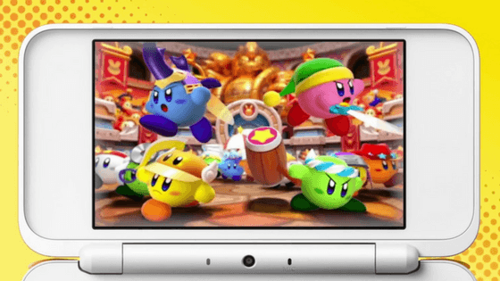 Kirby Battle Royale sur écran 3DS blanc, montrant plusieurs Kirby colorés en combat dans une arène dorée